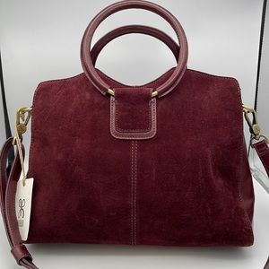 New with tags Hobo Heidi genuine leather bag in port.
